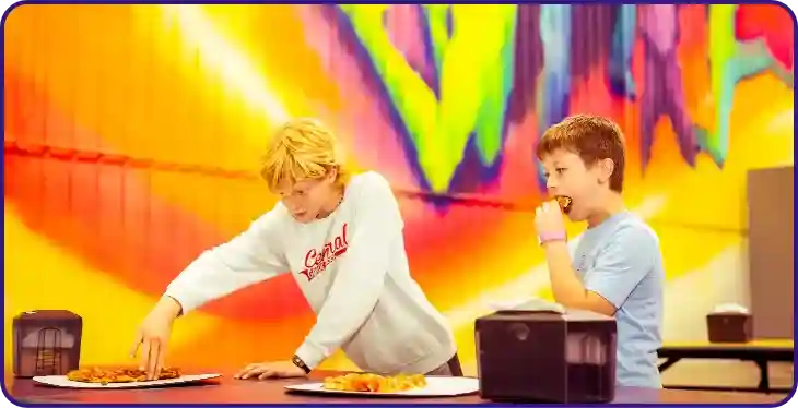 Kids eating pizza